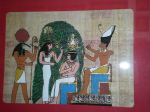 Le dieu Thot et pharaon aux écritures... avec leurs er sur son char de guerre calames. Isis et Nephtys... aux palabres.